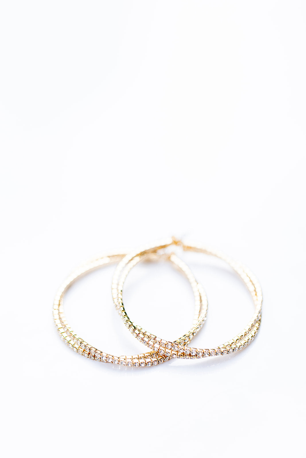 Blurred Lines Twisted Rhinestone Hoop